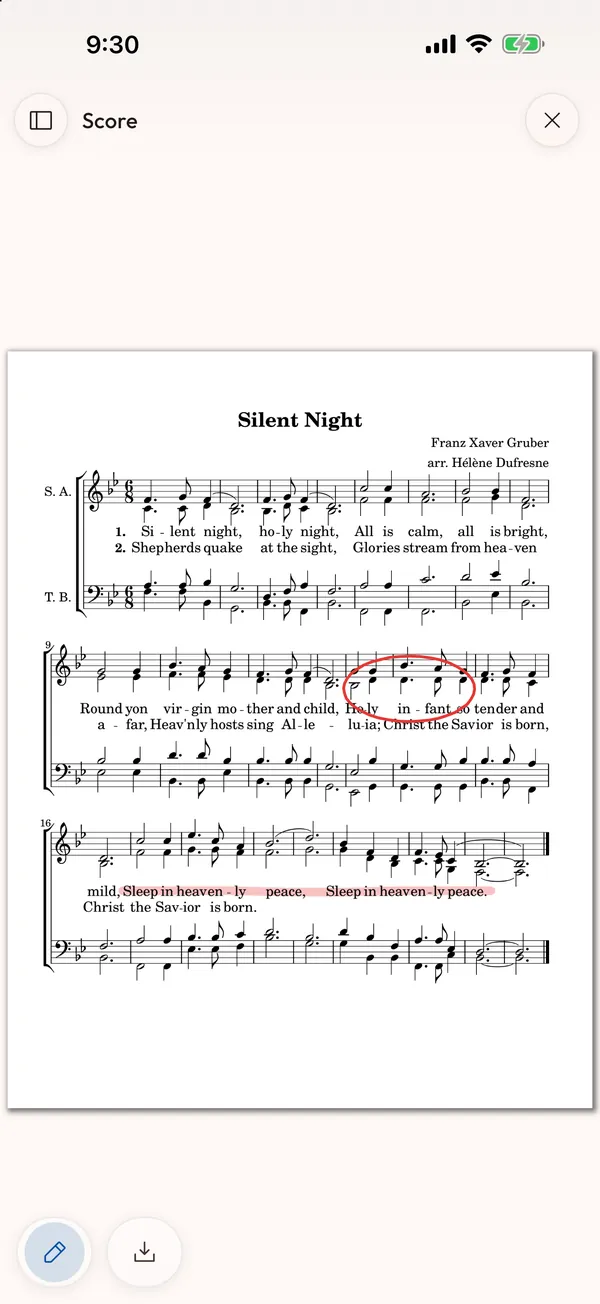 The marked-up score beside the audio.